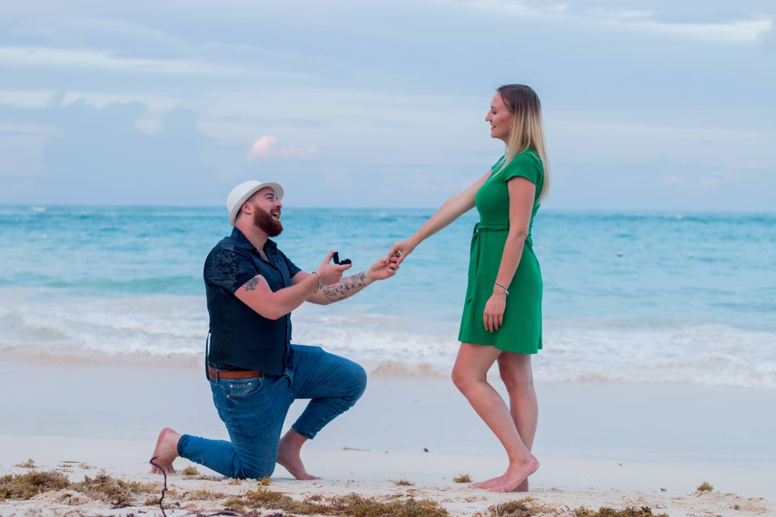 Bride and groom walking through a vineyard at dusk in golden Istrian light
